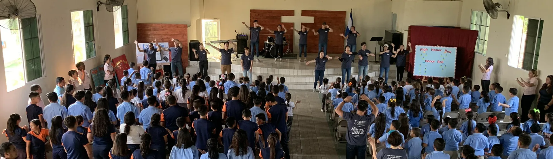GMMA volunteers leading an educational gathering with students.